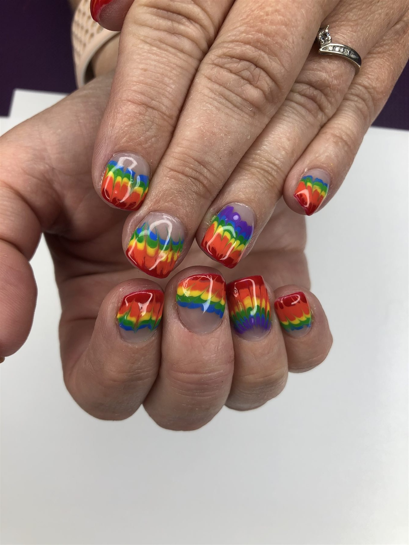 Rainbow marble nail art created for Pride Month