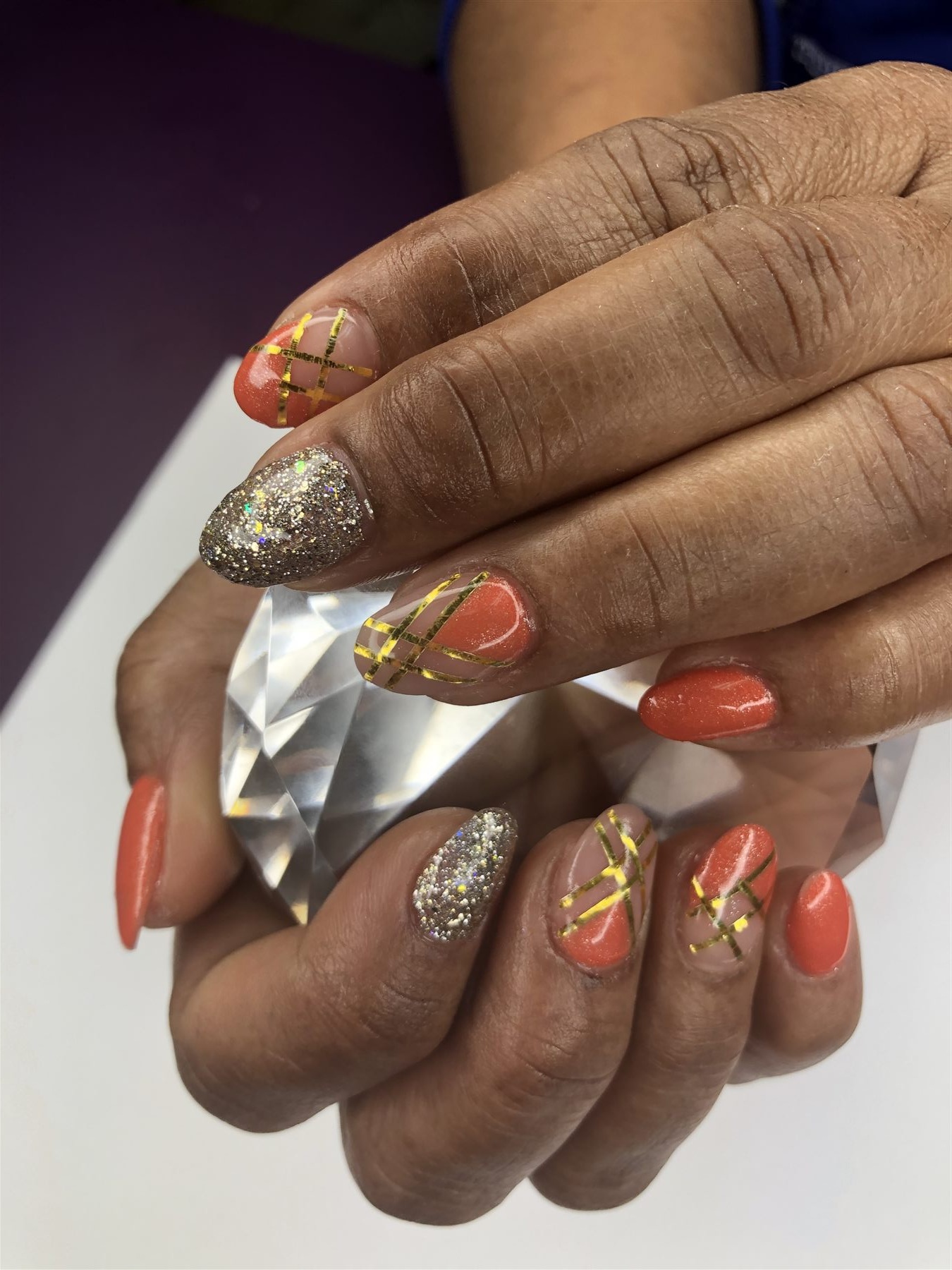 Coral Gold-Lined Nails
