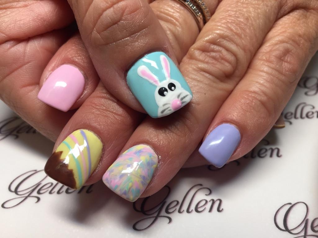 Pastel Easter nails with a sculpted bunny accent