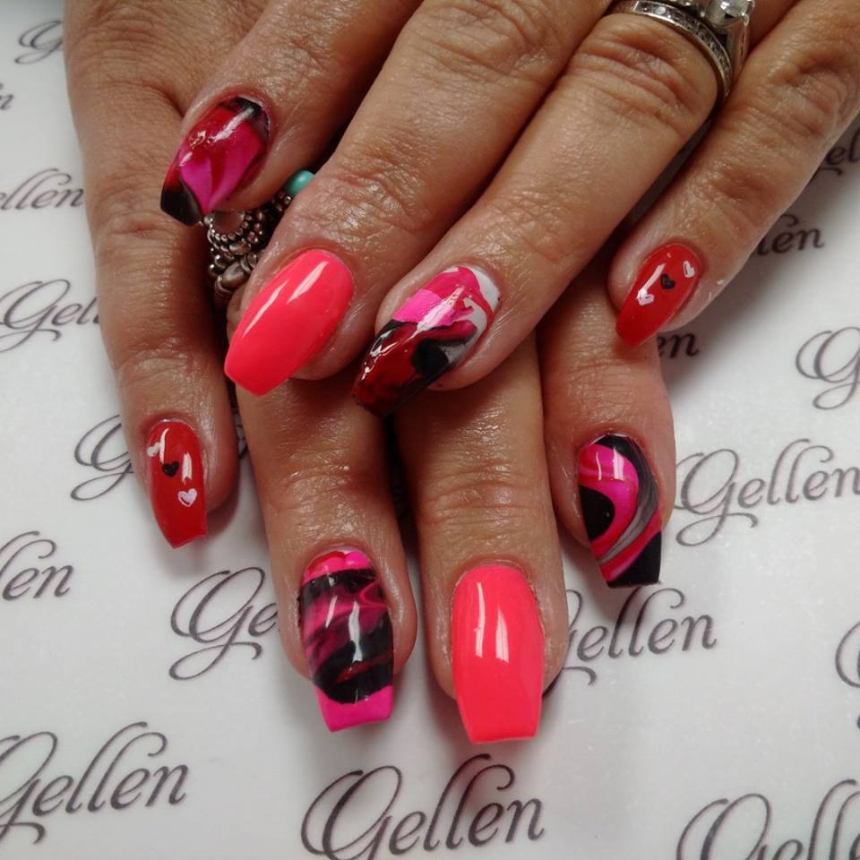 Pink, red and black Valentine nail art with painted hearts