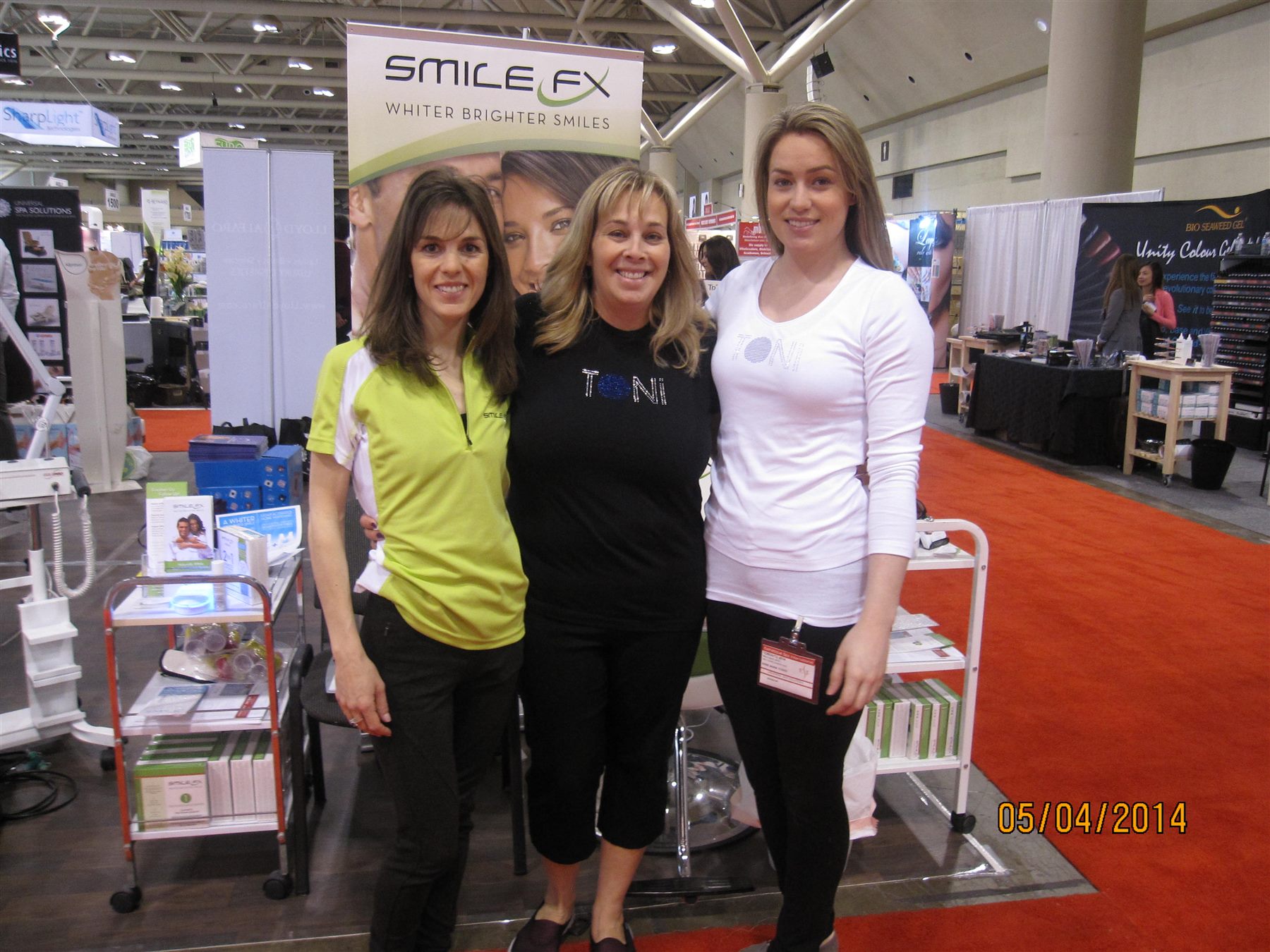 Ellen Flood at a professional teeth-whitening trade show in 2014