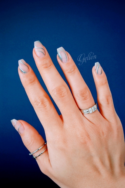 Nude nails with silver and black curved French accents