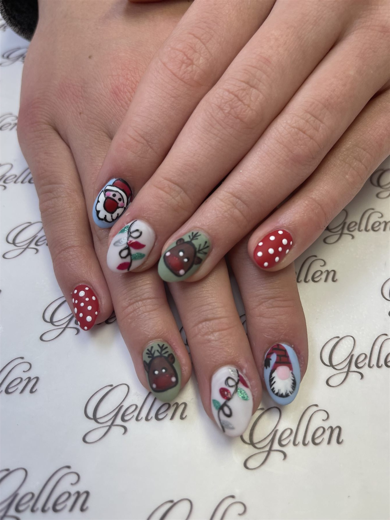 Christmas nails with Santa reindeer lights and polka dots