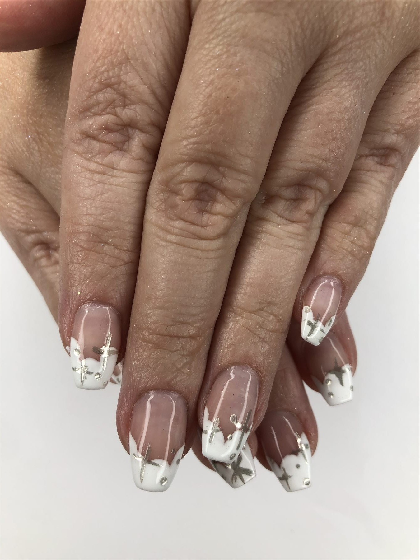 White French nails with abstract silver foil accents