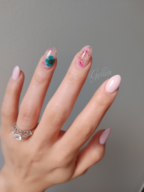 Blush pink nails with encapsulated pressed flowers