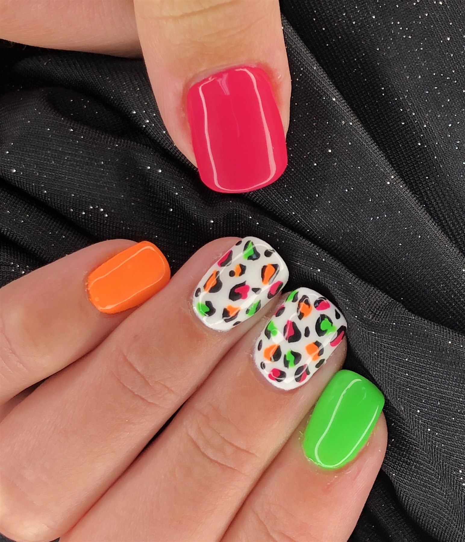 Neon pink orange green and leopard print nails