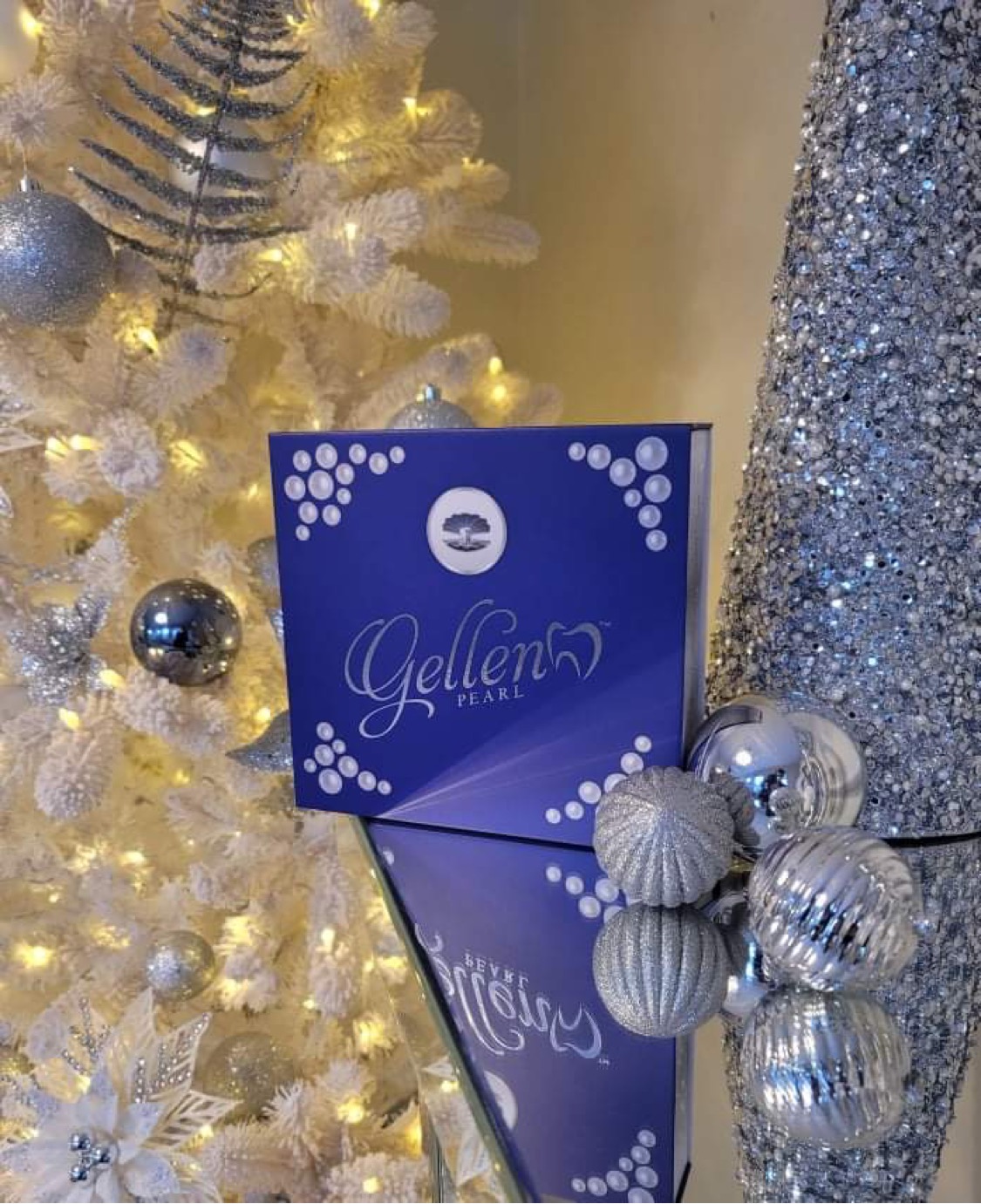 Gellen Pearl whitening kit displayed with silver and white holiday decorations